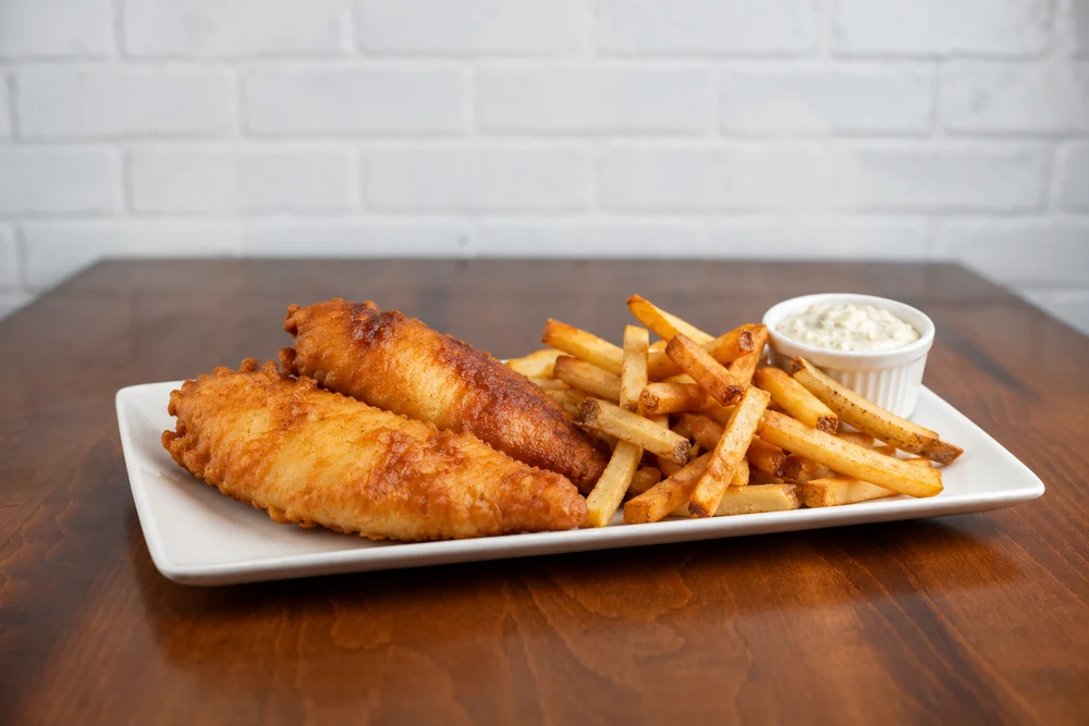 Golden fried fish and chips with tartar sauce
