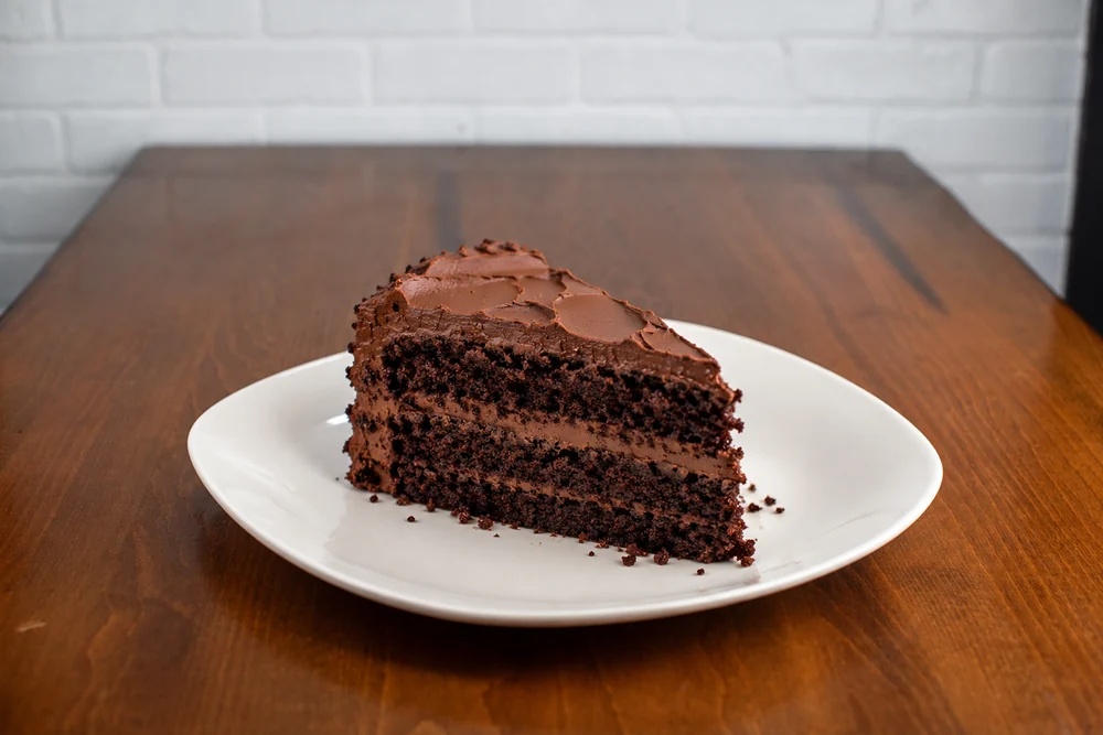 Example rotating cake selection, a slice of chocolate layer cake